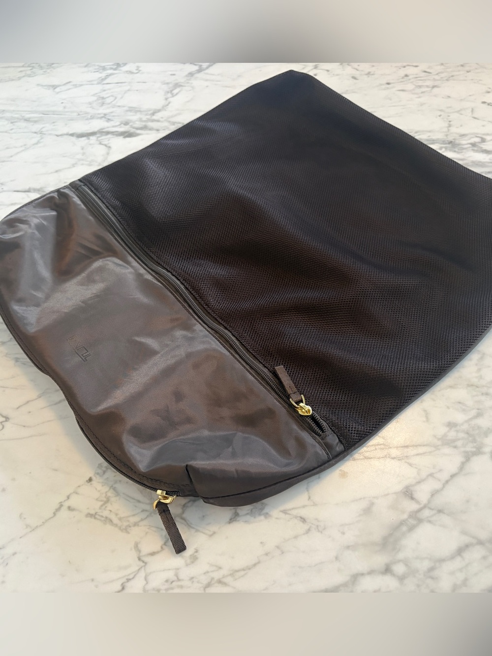 TUMI VOYAGEUR LAUNDRY BAG IN MINK